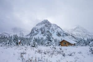 Fog, Cabin and Snow at Mount Assiniboine Provincial Park, Canada.