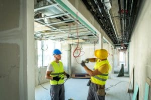 Electrician making wiring at new house