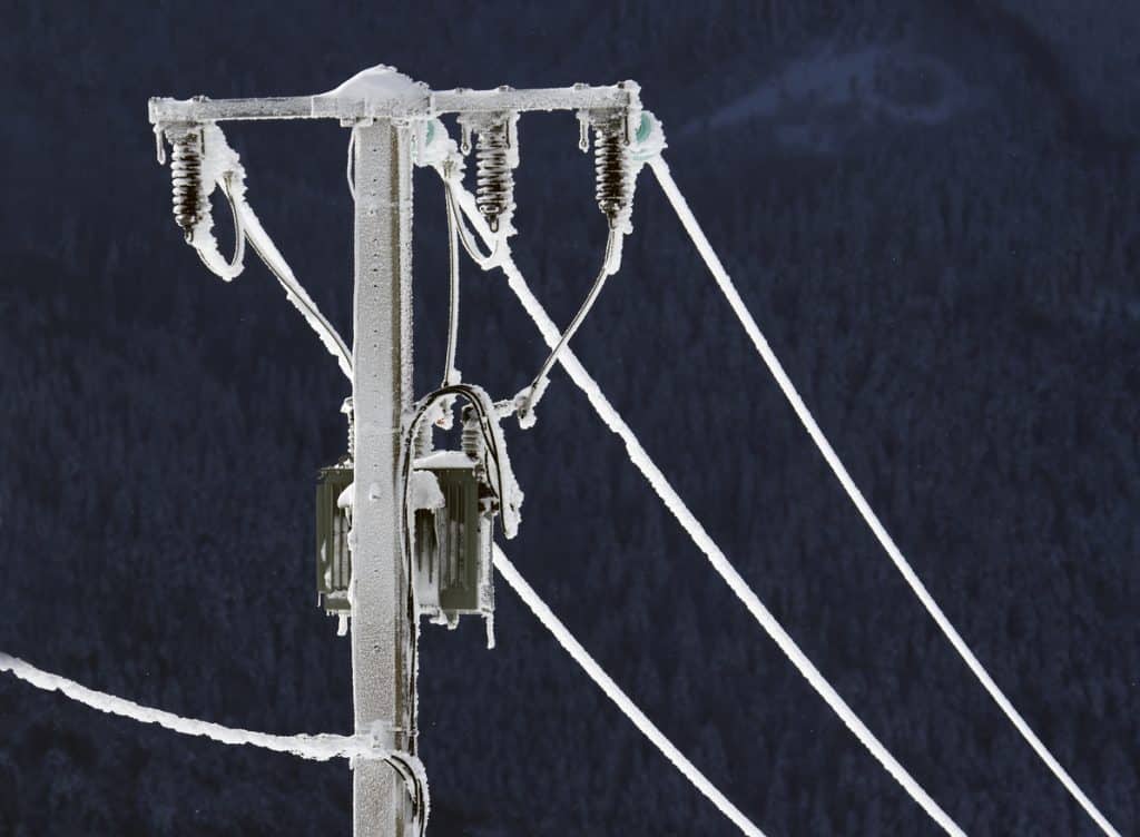 Electric cable frozen in winter