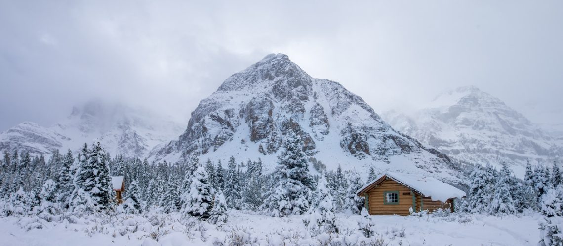 Fog, Cabin and Snow at Mount Assiniboine Provincial Park, Canada.